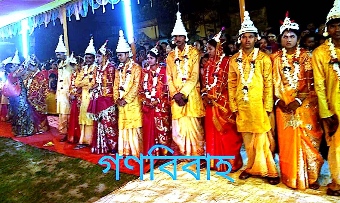 A wide view of couples at a community mass wedding ceremony